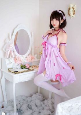 田丸麻纪子